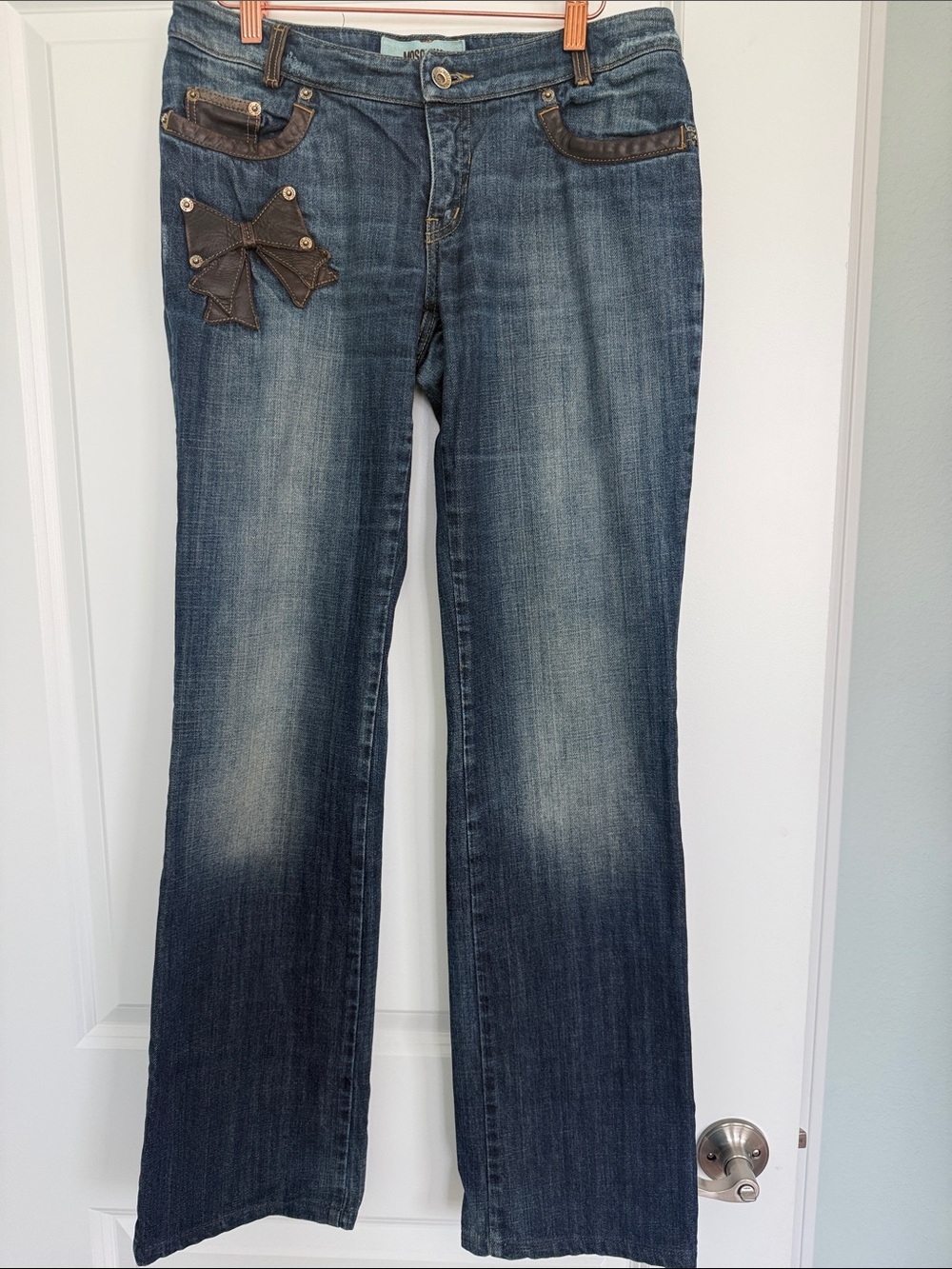 Moschino Blue Denim Flare Jeans with Brown leather Bow Accent